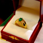 Gold ring with green emerald